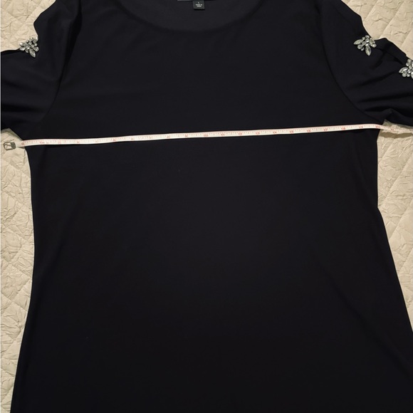 Black polyester/spandex blend, with embellished sleeves. - Picture 6 of 9